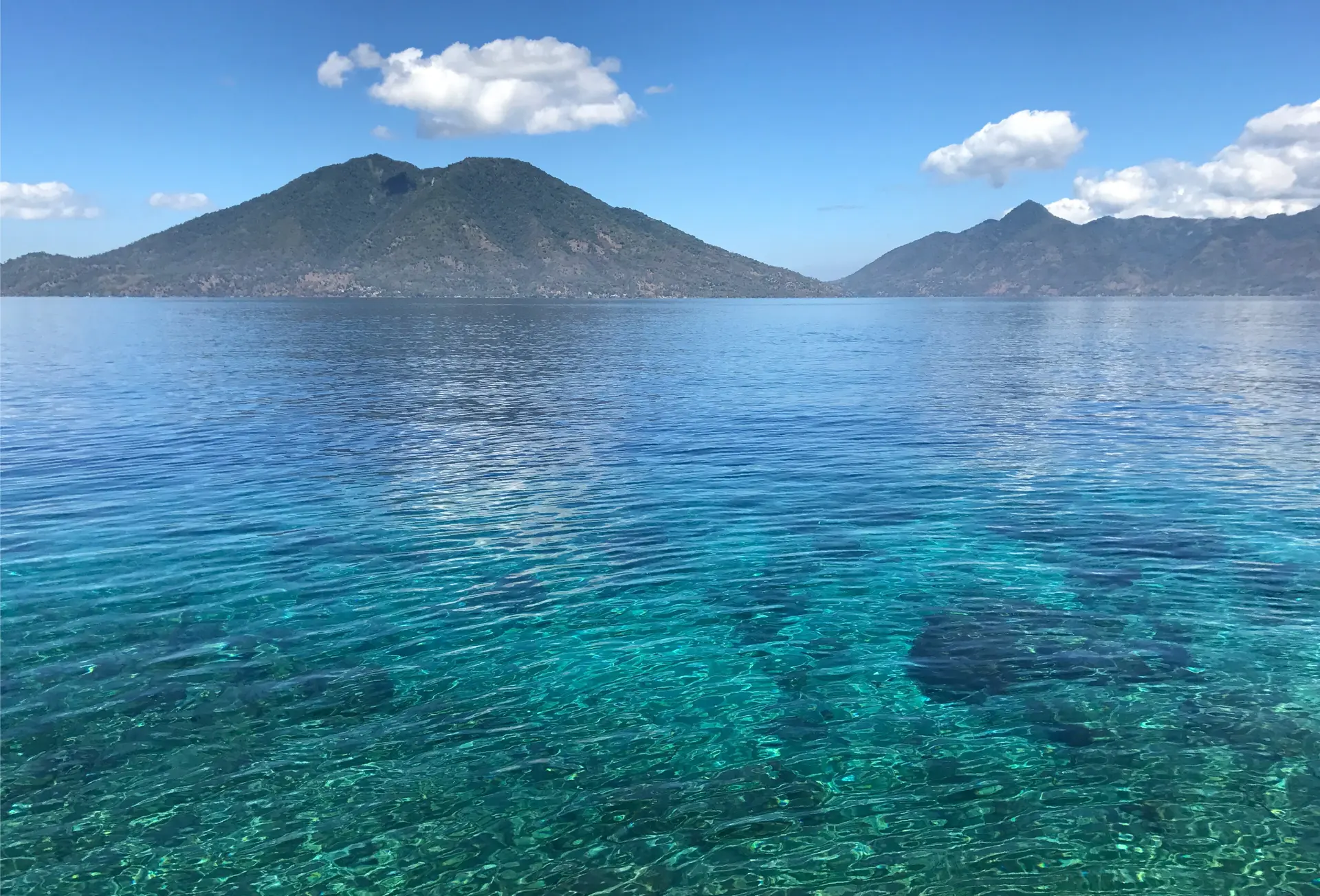 Clear shallow water over the reef at Pura Island in the Alor archipelago